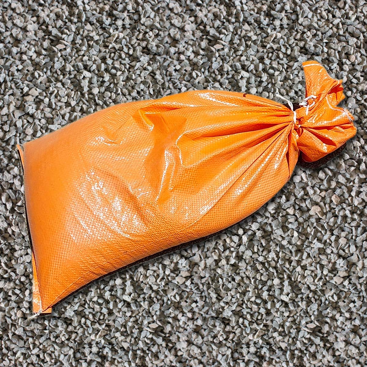 14mm drainage aggregate with orange hi-vis sandbags