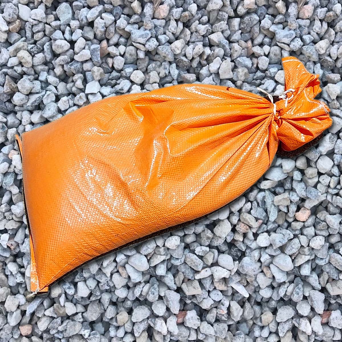 20mm drainage aggregate with orange hi vis sandbags